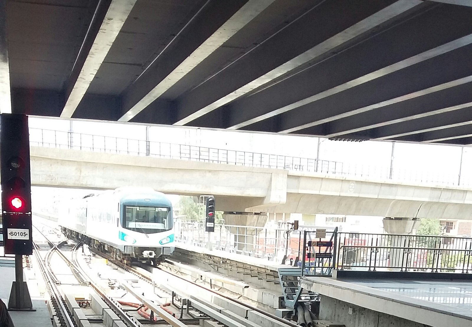 Real Rapid Metro train and elevated track in Gurugram